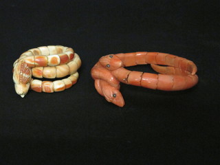 2 stained ivory tore bracelets in the form of serpents