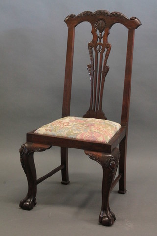 A Chippendale style mahogany slat back chair with upholstered  drop in seat, raised on cabriole supports