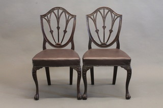 A set of 8 19th Century Hepplewhite style shield back dining  chairs with upholstered seats, raised on cabriole supports   ILLUSTRATED