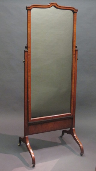 A 19th Century rectangular plate cheval mirror contained in a mahogany swing frame