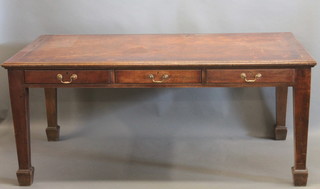 A 19th Century oak partner's table with inset tooled writing surface, fitted 3 long drawers with brass swan neck drop handles,  raised on square tapering supports 71"
