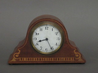 A French bedroom timepiece with enamelled dial and Arabic numerals contained in a mahogany Admiral's hat shaped case