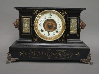 A 19th Century American 8 day striking mantel clock with  enamelled dial and Arabic numerals contained in an iron architectural case