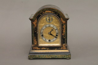 A chiming mantel clock with arch shaped gilt dial and silvered chapter ring, contained in a domed chinoiserie case   ILLUSTRATED