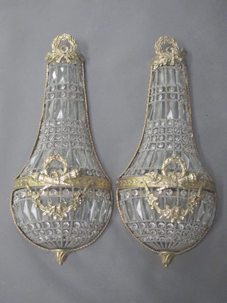 A handsome pair of gilt metal and cut glass wall lights of urn  form, 28"