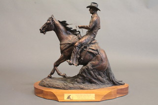Mein Lawson, a bronze figure of a Cowboy, the base marked  Mein Lawson Copyright 2000 NRHA, with plaque marked Carolina Classic Derby Show #1 Regional Raleigh, NC May 6th  -9th 2004, $2000 added NRHA Open, 20"