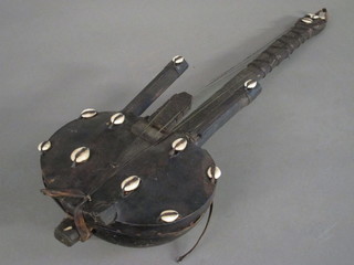 A curious Eastern stringed instrument