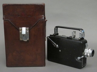 A Velocidad 16mm cine camera complete with leather carrying  case