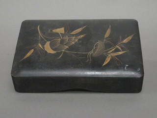 A rectangular Oriental lacquered box the lid with floral  decoration 8"