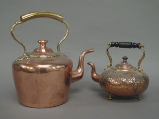 A circular embossed copper kettle and 1 other copper kettle