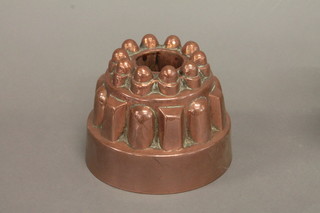 A cylindrical copper jelly mould  ILLUSTRATED
