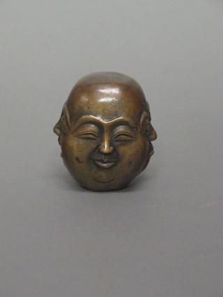 An Eastern bronze multi headed figure of a Buddha 2"