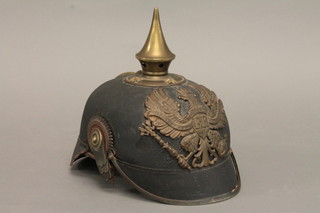 A Prussian Officer's Pickelhaube helmet , some corrosion and strap missing  ILLUSTRATED