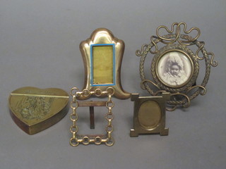 A gilt easel photograph frame 4", a circular Victorian pierced gilt metal easel photograph frame 5", 1 other 3", 1 other 2" and a  heart shaped trinket box