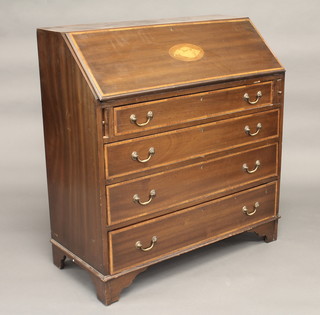 An inlaid mahogany bureau, the fall front revealing a well fitted interior above 4 long graduated drawers, raised on bracket feet  36"