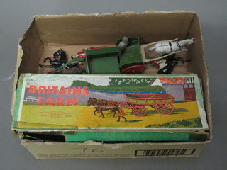 A Britains farm set comprising horse and cart, 2 other carts etc