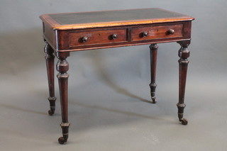 A Victorian rectangular mahogany writing table with inset  writing surface fitted 2 short drawers, raised on turned supports  36"