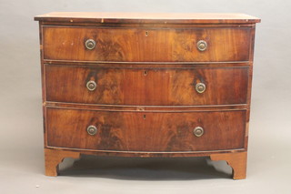 A 19th Century mahogany bow front chest of 3 long drawers,  raised on bracket feet 44"