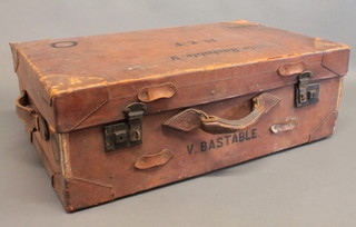 A leather suitcase with metal fittings