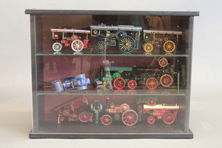 A collection of model traction engines contained in a display cabinet