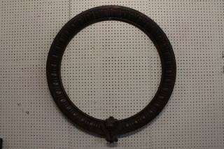 A circular Victorian carved oak frame 31"