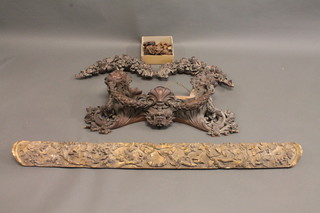 A Victorian carved oak bracket with lion mask floral decoration  33", 2 carved oak garlands 19" and a collection of carved oak  pieces