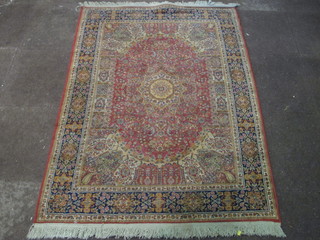 A rust ground Belgian cotton style rug 67" x 49"