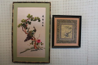 An Oriental silk embroidered panel depicting a bird 11" x 9" and  1 other embroidered panel of birds 22" x 12"