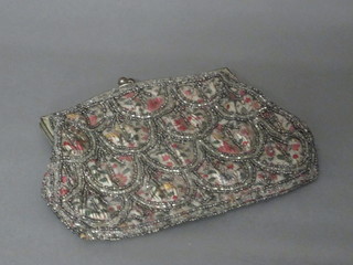 A lady's embroidered evening bag 5"