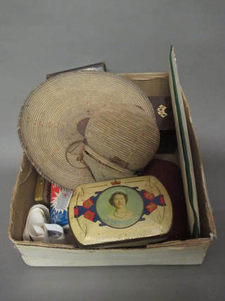 A WWI shaving mirror, an Addiator calculator, a tin containing a collection of match boxes, a circular Eastern woven tray and a jar  and cover