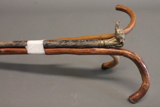 A Royal Air Force swagger stick and bundle of walking sticks