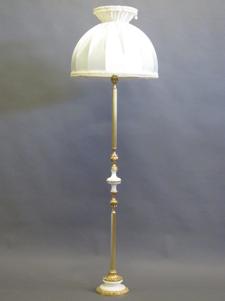 A reeded gilt metal and alabaster standard lamp