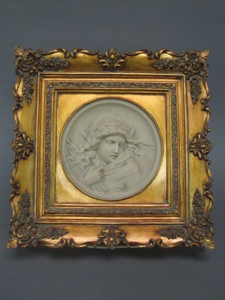 A resin plaque - portrait of a lady 7" circular, contained in a gilt  frame