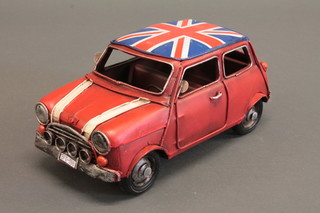 A pressed model of a mini 9"