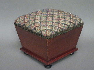 A Victorian mahogany waisted square footstool raised on bun feet  9"
