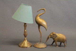 A brass figure of a standing stork 16", do. elephant and a table lamp