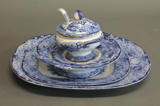 A 19 piece Royal Doulton Geneva pattern dinner service  comprising oval meat plate 7", oval meat plate 13", twin handled bowl 10", twin handled soup tureen, stand and sauce ladle, 7 side  plates 9", 6 soup bowls, an oval twin handled dish 7" together  with 2 blue and white plates