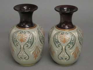 A pair of Langley Mill club shaped salt glazed vases