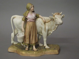 A Royal Dux figure of a standing milkmaid and cow, base with  pink triangular mark and incised 830 8"  ILLUSTRATED