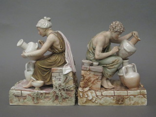 A pair of Royal Dux figures of seated classical potters, the bases  with pink triangular mark and incised 270, 8"   ILLUSTRATED