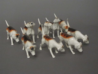 A pack of 9, 4 1/2 couple, of Beswick fox hounds, 1 tail f,