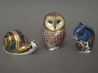 A Royal Crown Derby porcelain limited edition garden snail paperweight and 2 others - Grey Squirrel and a Barn Owl