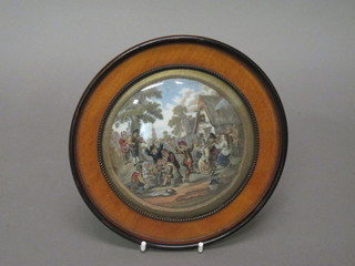 A 19th Century Prattware pot lid - The Village Wedding  contained in a mahogany socle frame