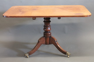 A 19th Century rectangular mahogany snap top breakfast table,  raised on pillar and tripod supports 48"