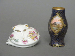 A Minton Haddon Hall figure of a sleeping fox 3" and a Royal  Doulton blue ground vase with panel decorated landscape 3 1/2"