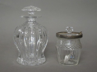 A circular cut glass preserve jar with silver mount 3" and a small decanter and stopper 6"