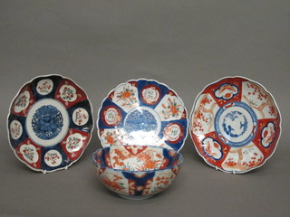 A circular Japanese Imari porcelain bowl with lobed body 7" and 3 circular Imari porcelain plates with lobed decoration 8"