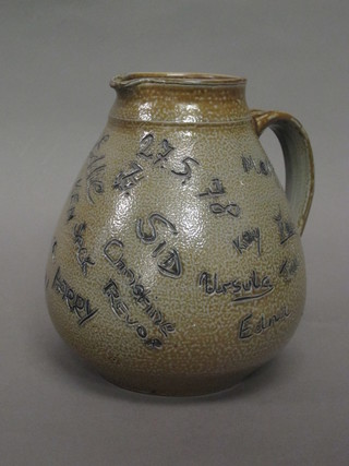 A German salt glazed jug with various signatures, base marked  Helenclor 8"