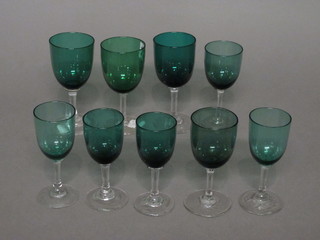9 various green glass glasses with clear glass stems