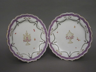 A pair of Worcester porcelain plates the reverse with purple mark and 12 dots, retailed by Mortlock of Oxford Street 9"